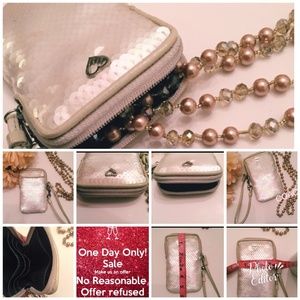 SOLD Coach poppy wristlet